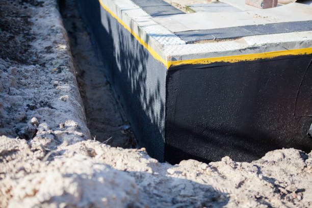 Residential Interior Drainage System installation at a Lowell, MI home by SJ Waterproofing Pros